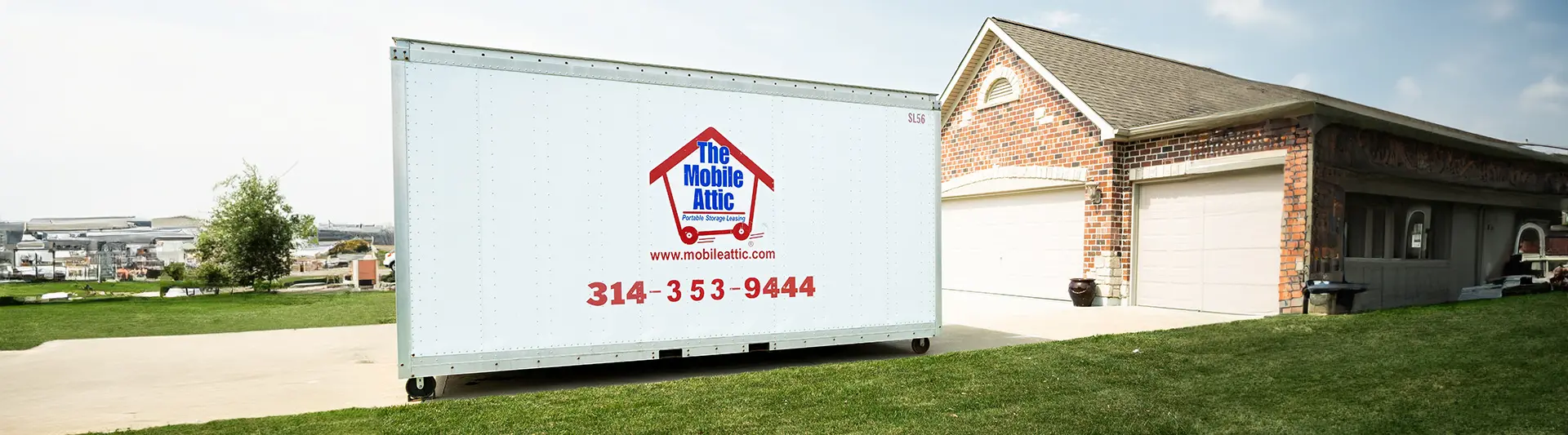the mobile attic storage container sitting in a customer driveway