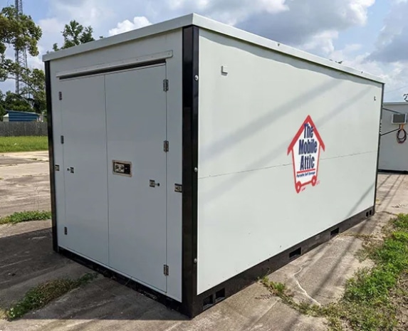 a mobile attic sitting in a driveway